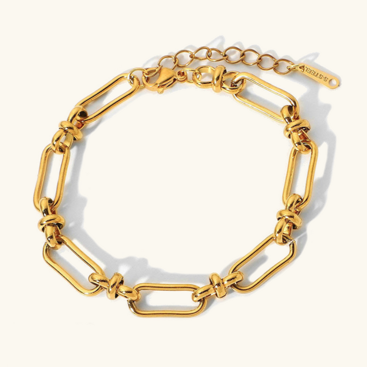 Marisa – Pulsera dorada con una delicada estructura doble.