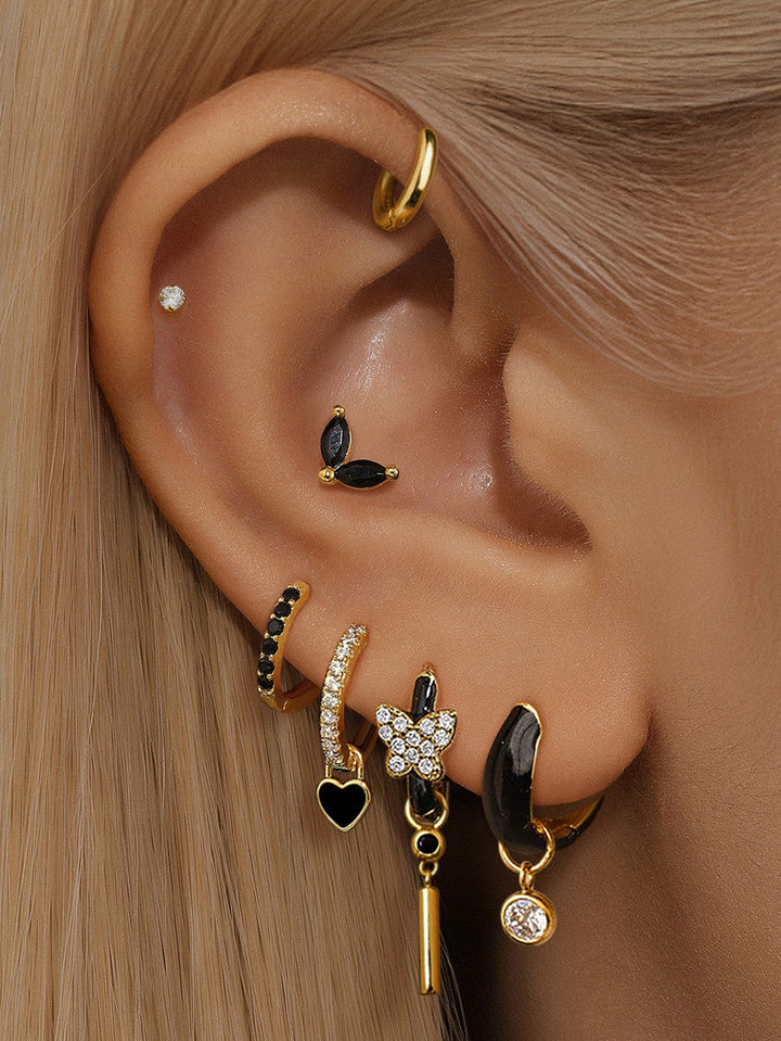 Theresia – Pendientes dorados con suave curvatura.