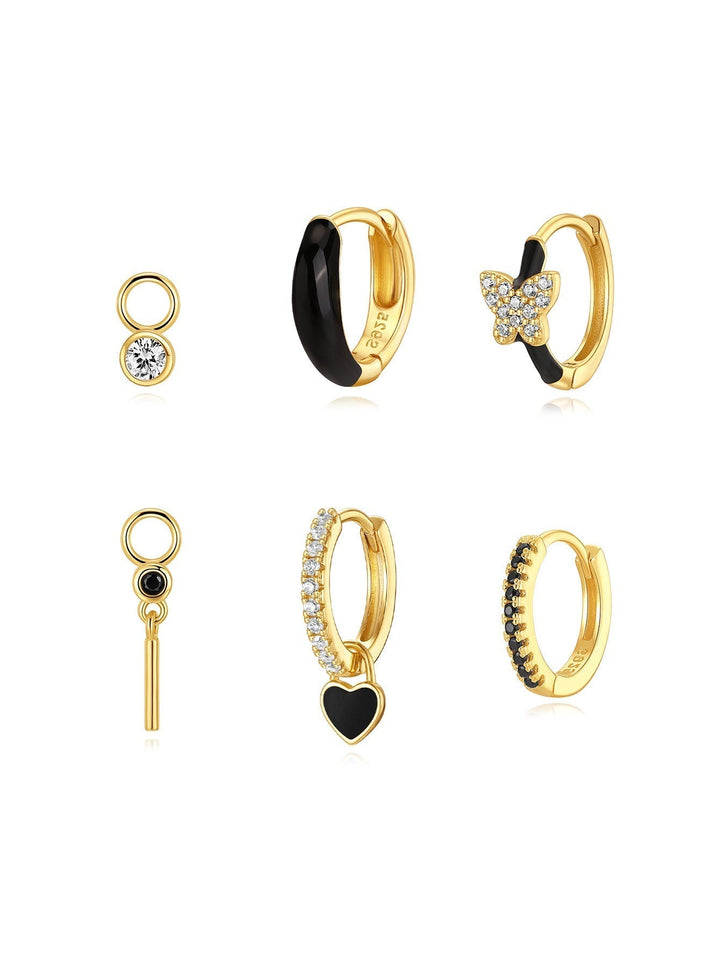 Theresia – Pendientes dorados con suave curvatura.