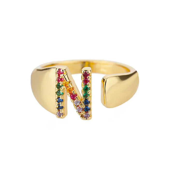 N - Anillo de acero inoxidable dorado con iniciales