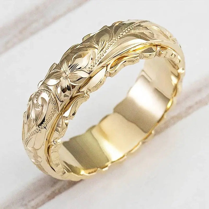 Anillo floral dorado inspirado en la antigüedad