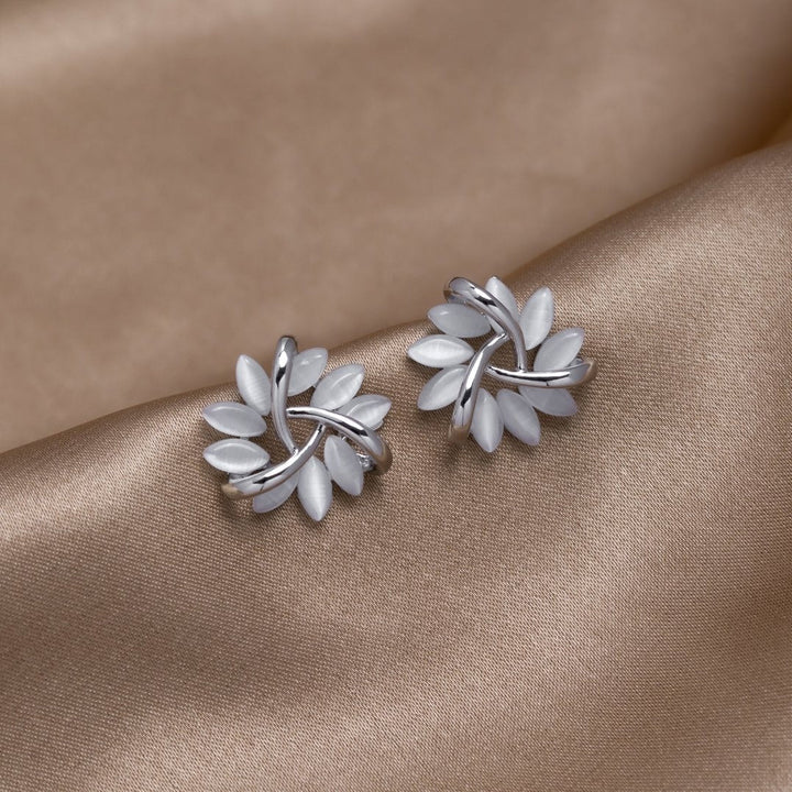Flora – Pendientes de plata en forma de flor.
