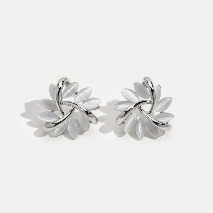 Flora – Pendientes de plata en forma de flor.